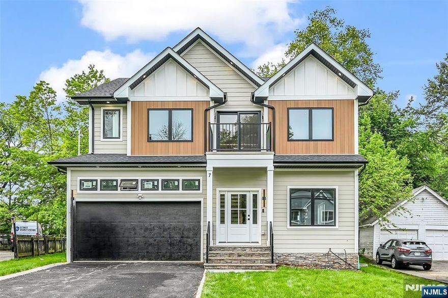 Welcome to this stunning NEW CONSTRUCTION Colonial home, located in a desirable Livingston neighborhood and the Mt Pleasant Elementary School district, within walking distance to the library, high school, and town center. Set on a leveled lot with a fenced backyard, this impressive 6-bedroom, 5-bath residence offers luxury living across three beautifully designed levels. A grand double-height foyer introduces the main level, featuring a formal living room, elegant dining room, guest bedroom, full bathroom, and mud room. The inviting open-concept layout showcases designer finishes throughout. The gourmet eat-in kitchen features custom cabinetry, a spacious center island, high-end appliances, quartz countertops, and a walk-in pantry. The family room flows from the kitchen and includes an elegant fireplace and sliding doors leading to the expansive flat backyard, ideal for entertaining. Upstairs are four generously sized bedrooms, including a luxurious primary suite with his-and-her walk-in closets and a spa-inspired bath with soaking tub, stall shower, and dual sinks. One bedroom is en-suite while two share a full bath. A convenient laundry room and BALCONY complete this level. The finished basement provides additional living space with an additional bedroom, large recreation room, and full bathroom. Modern smart home features and a 10-year builderâ€™s warranty ensure peace of mind.