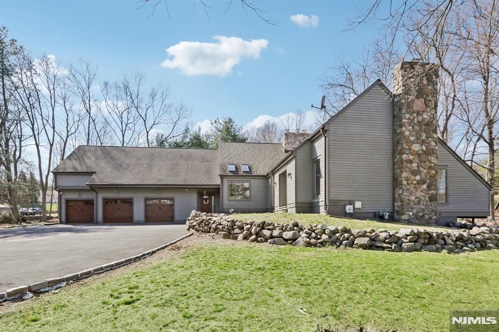 Photo of 11 Carlough Road, Upper Saddle River, NJ 07458 (MLS # 26004905)