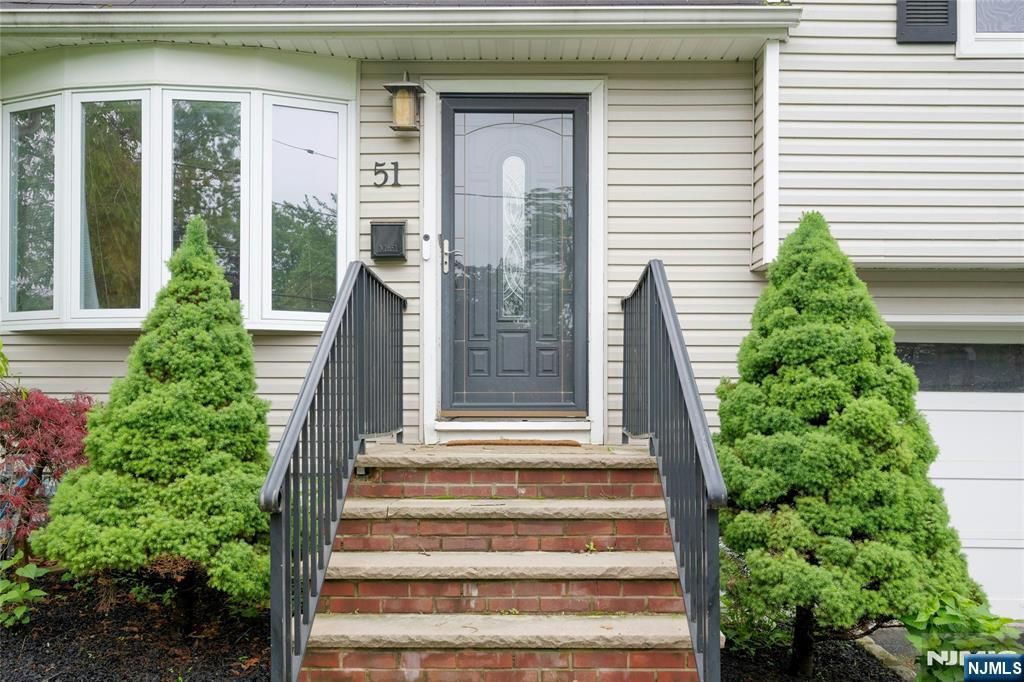 Photo of 51 Essex Road, Cedar Grove, NJ 07009 (MLS # 25022978)