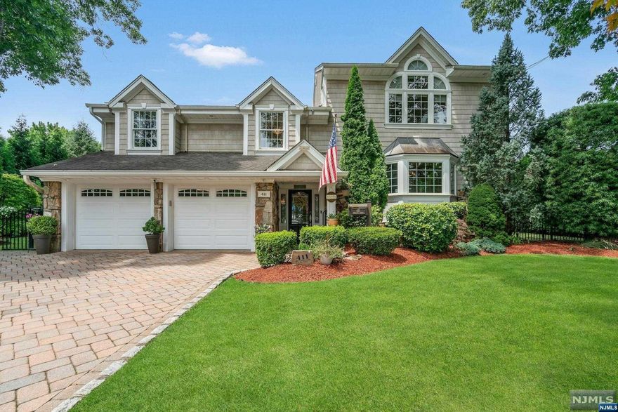 Enjoy fabulous bright, open living in this beautifully expanded & updated home in the desirable town of Cresskill. Ideal for entertaining, this home features a spa-like backyard with gunite pool, spa, outdoor kitchen, & exquisite landscaping. The welcoming entry showcases open staircases leading upstairs & downstairs. The well-equipped kitchen boasts a large granite-seated island, eat-in table area, & opens to a vaulted family room with a stone fireplace & access to the backyard patio. The banquet-sized dining room is perfect for family & guest gatherings, while a second family room offers a great space for watching movies, playing games, or enjoying music. An inviting private primary suite features a vaulted ceiling & a luxurious bath. This home is designed for easy living, with its open floor plan, outdoor pool, outdoor kitchen, & indoor cabana. At night, enjoy the magical ambiance created by the nightscape lighting. A perfect blend of comfort & elegance in a prime location.