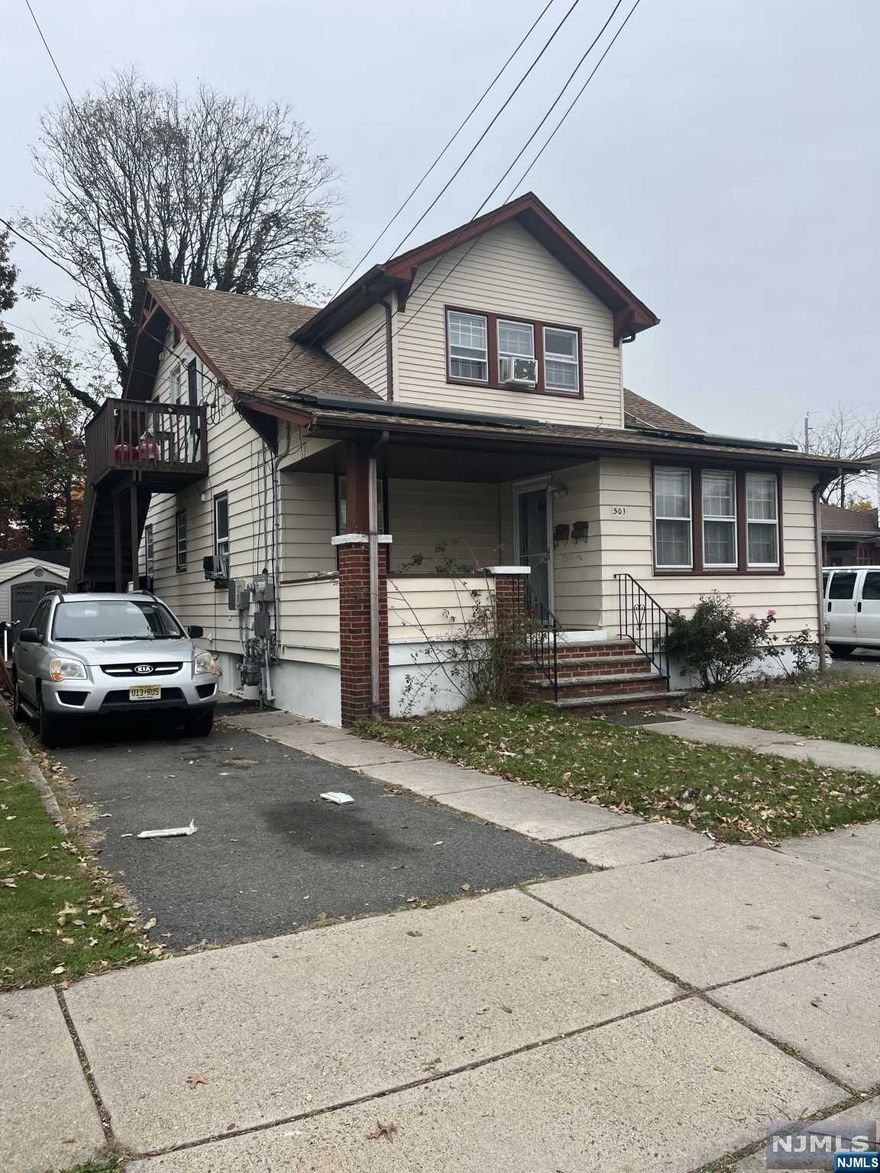 Two family house which offers 2 bedrooms, EiK, dining room, and bath on 1st floor. 2 bedrooms, EiK, living room and bath on the second floor. Separate utilities. Partially finished basement to accommodate your storage and ample parking on driveway to fit up to 6 cars. NOT in a flood zone. **PROPERTY BEING SOLD IN AS-IS CONDITION**