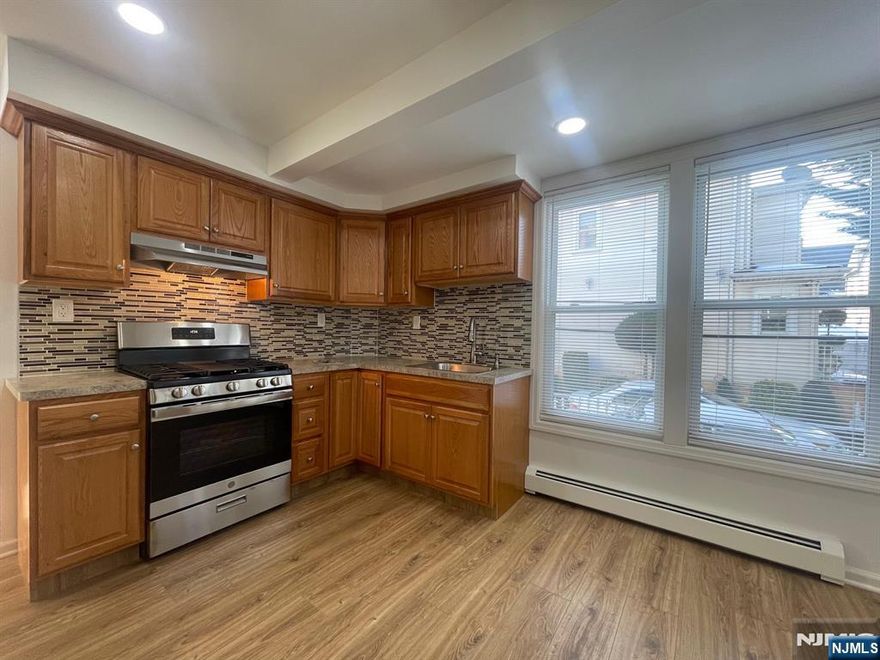 Well-maintained 2-bedroom, 1-bath apartment in Kearny featuring a spacious living room and an eat-in kitchen. Shared use of the yard and laundry hookups available in the basement. Conveniently located near shopping, dining, and major transportation.