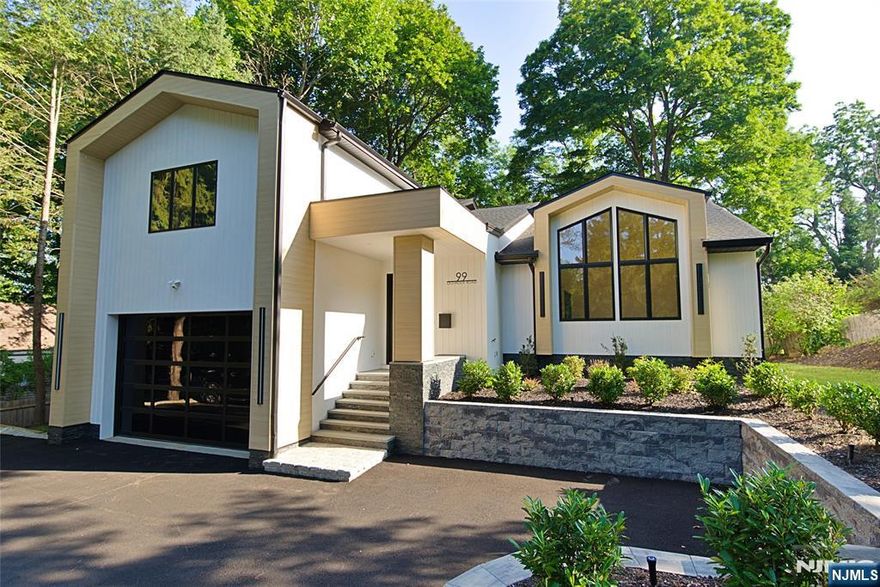 Wonderful, new construction on the existing foundation, Colonial home in Closter NJ. Built by one of Northern New Jersey's premier builders this 5 bedroom 4.5 bath home has over 4380 livable square footage. First floor has vaulted ceilings in the living room, huge, custom kitchen with designer sink, complete with food prep stations with 2 faucets, Jenn Aire and GE Cafe appliances & sliding doors to large deck overlooking an oversized rear yard, formal dining area, Family room with fireplace and custom cabinetry, powder room and 2 car garage with 14 foot ceilings perfect for car lovers. Second floor has jack & Jill bedrooms and full bath, 2 additional bedrooms, another full bath, laundry room with mop sink, primary bedroom with custom walk in closet & primary bathroom. Basement has home theatre, large rec room, office area, full bathroom, large storage area. Hardwood floors, multi zone heat & ac, LED lighting, custom cabinetry, underground sprinklers, central vac and so much more. Located walking distance to NYC bus and top rated schools. Don't miss out!ustom walk in closet & primary bathroom. Basement has home theatre, large rec room, office area, full bathroom, large storage area. Hardwood floors, multi zone heat & ac, LED lighting, custom cabinetry, underground sprinklers, central vac and so much more. Located walking distance to NYC bus and top rated schools. Don't miss out!