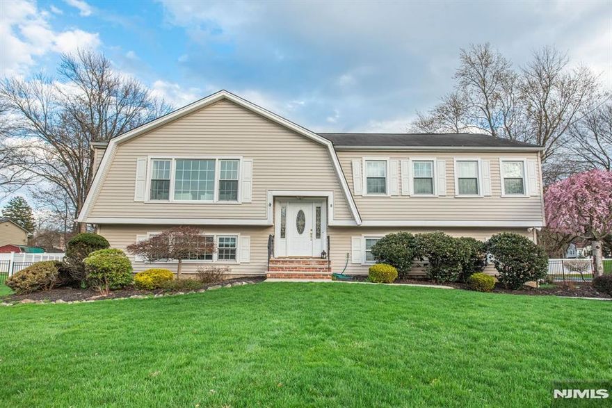 Welcome to the one youâ€™ve been waiting for! This beautifully renovated 4-bedroom, 2.5-bath home is perfectly situated on a quiet cul-de-sac and offers the ideal blend of comfort and style. Step inside to an open floor plan featuring a dream kitchen with a center island, seamlessly flowing into the living and dining areasâ€”perfect for everyday living and entertaining. Sliders lead to a spacious deck overlooking a stunning in-ground pool and a large, fully fenced backyard. The primary suite offers a private retreat with a full bath and walk-in closet. The ground-level family room and bedroom provides additional living space with sliders leading to a patio, creating the perfect indoor-outdoor lifestyle. Nothing to do but move right in!
