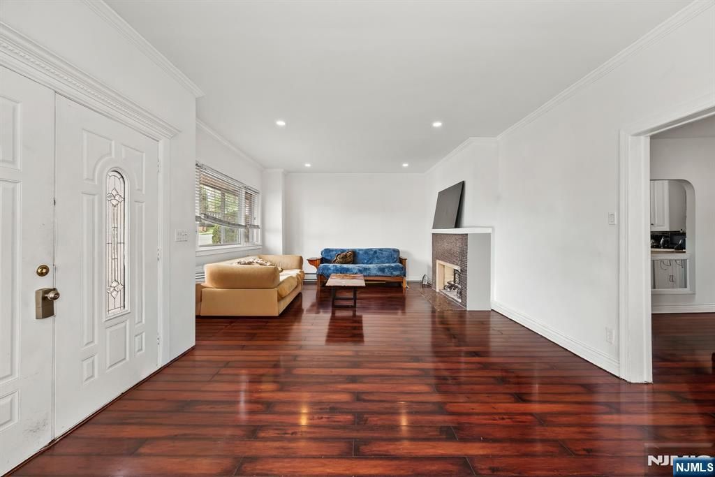 Photo of 334 Brook Avenue, Passaic, NJ 07055 (MLS # 26013073)