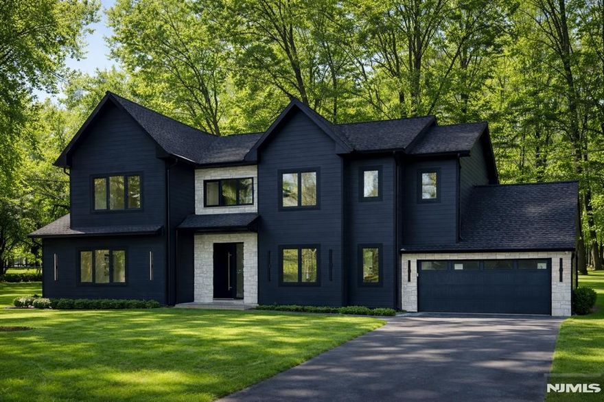 Stunning new construction on existing foundation built by a local builder using premium materials,6 BR/5 BATH. Approximately 5000 sqft of living space.Located on a quiet street in the heart of town. 9' ceiling throughout, 1st floor has an open floor plan with great flow and layout, wide engineered hardwood floors with modern details throughout. Designer chef kitchen w/ quartz countertops and high-end appliances.Dinning RM, great RM with gas fireplace and a first floor bedroom with full bath along with a walk-in pantry & mudroom with french doors leading to the backyard. Second floor features spacious rooms, primary suite w/ tray ceiling, custom walk-in closets and luxurious designer bath.Additional 3 BR,2 BATHS(one in-suite) and laundry RM complete the second floor. open REC RM in the basement, bedroom, office / gym, full bath and utility room. Additional features: 4 Heating / Cooling Zones, perimeter cameras, sprinkler system, smart functionally throughout. Owner=LIC RE Agent.