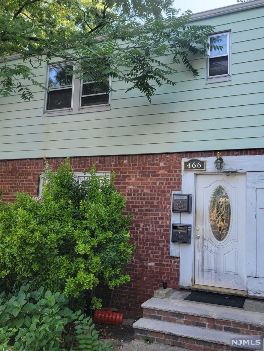 Fantastic investment opportunity, excellent location, desirable neighborhood, within walking distance to express NYC transportation and local downtown shopping! offers 1st. fl. kitchen, living, 1 bedroom and 1 bath. 2nd. fl. kitchen, living, 1 bedroom and 1 bath. basement space. All separate utilities, attached garage. "Property is being SOLD in AS IS condition.BUYERS ARE RESPONSIBLE FOR ALL MUNICIPAL INSPECTIONS.