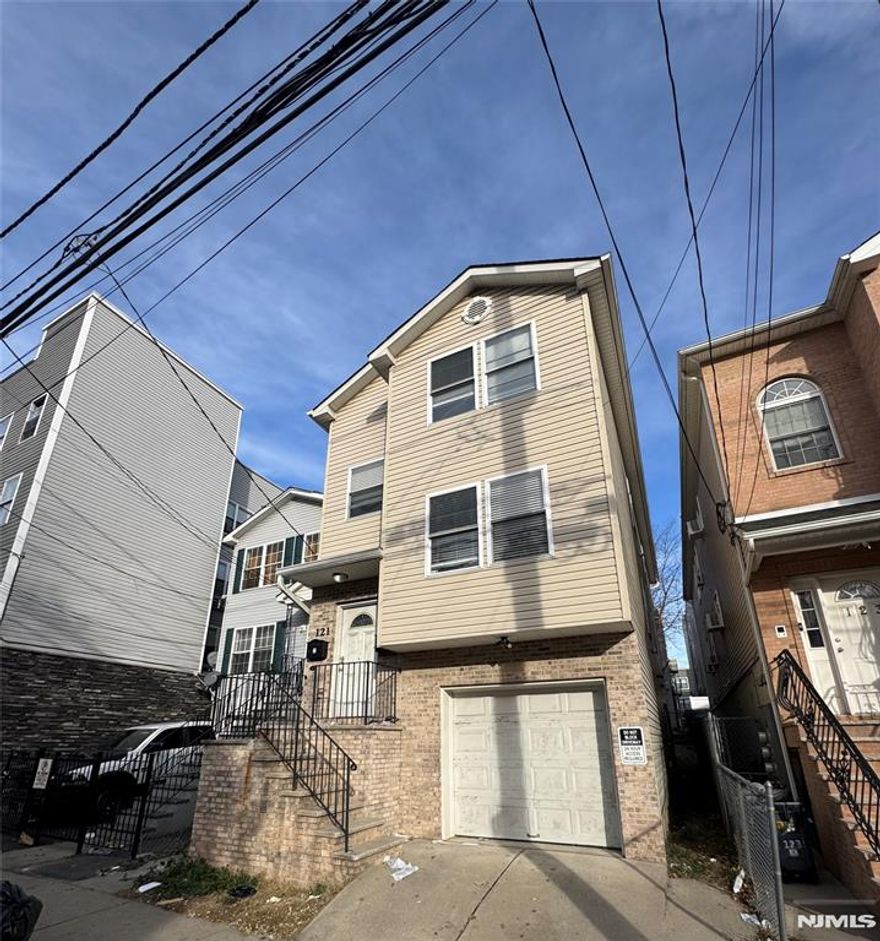 AVAILABLE IMMEDIATELY! Step into this beautifully renovated 2-bedroom, 1-bathroom apartment located in the heart of Paterson. Enjoy a modern, open-concept layout featuring fresh paint throughout, a brand-new kitchen with stainless steel appliances, and the convenience of an in-unit washer and dryer. The spacious primary bedroom includes its own private balcony, perfect for relaxing. Don't miss out on this move-in-ready home!