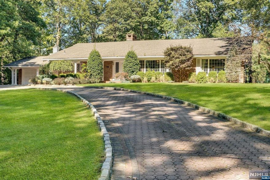 A circular driveway paves the way to this beautiful, serene setting for this Midcentury Ranch on a 1 acre lot with the back of the property bordering the golf course. The entire house has brick siding, there's a front porch & backyard features patios, in ground pool & tennis court, all surrounded by mature landscaping.Never on the market, this home has original details of the time it was built in 1961. Although this house needs updating, it has great potential with layout and appx 3000 SF of living space, not including the 2 car att garage and unfin basement. Original details include Cherry paneling, in FR/DR, LR & Foyer. FR and DR have beams, & SLD to backyard. Brick FP wall in LR, lead glass windows in the Foyer, built ins in DR/LR. Brick focal walls in Kit/DR. Property shall be offered for sale in its 'AS IS, WHERE IS, WITH ALL FAULTS' condition. Bank required addendum to the sales contract must be signed by potential buyers and submitted with offers.