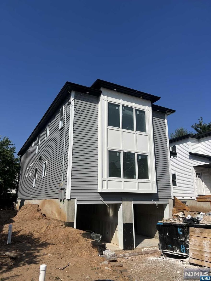 Welcome to your brand NEW construction two family home. This top over bottom two family home features the following: Unit 1 - three full bedrooms including a primary ensuite, three full baths, open concept kitchen and living area, laundry on first floor, fully finished basement including one of the full baths, and a garage. Unit 2 - three full bedrooms including a primary ensuite, two full baths, open concept kitchen and living area, laundry, and a garage. Both units will have hardwood floors, kitchens with quartz counters, shaker cabinets, stainless steel appliances, modern baths, central AC, and more! Approx 2900 square feet + two car garage + finished basement area. Located in the desired Fairmont section of Hackensack you won't want to miss out on this income producing opportunity. Get in early to pick your finishings. Property estimated for completion July 2024.