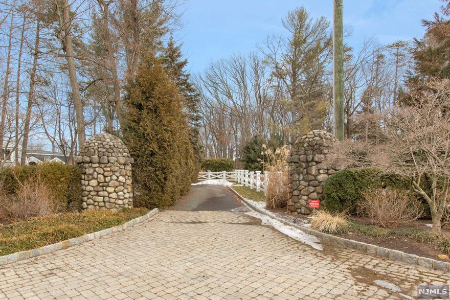 Magnificent Stone Pillars greet you as you enter the Circular Drive to this Beautifully Renovated Williamsburg Colonial! Great South Gate Urban Farms Cul-de-Sac! Just a stone's throw to the Indian Trail Club! 2 Sty EF! Gorgeous Oak Flooring & Custom Moldings Throughout! Voluminous Great Room w/Palladium Windows, Floor-to-Ceiling Brk Fpl, Cathedral Ceiling, Multiple French Doors, Skylights, & Bar. Lovely Williamsburg FR w/Brk Floor & Brk Fpl, Built-Ins, and Large Bay Window! Great Renovated Eat-In Kitchen w/Granite Center Island, Garden Window, Breakfast Area & Floor to Ceiling Bay Windows! Large Bright FLR & Oversized FDR w/Bay Window! Expansive Private Owner's Suite w/Vaulted Ceiling, Wood Burning Stove, Picture Window, Walk-In Closets, Dressing Area & Renovated Bath w/Huge Skylight! 3 More Bedrooms Plus Office! B/SOT! Refinished Basement! 2 Car Attached Gar Plus 1 Car Detached Gar! Hike, Kayak, & Paddle in FL Nature Preserve! Great Schools & Low Franklin Lakes Taxes! Hurry!