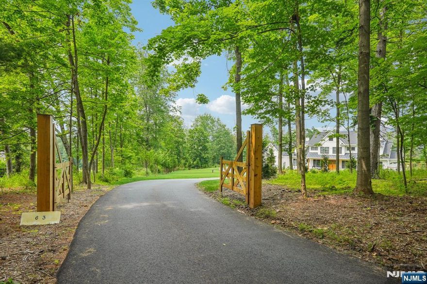 Enjoy a magnificent 2 year old home with 10ft first floor ceilings on 6 acres at the end of a private road. Taxes only $38,857. This McCann-built masterpiece, provides privacy and a convenient location in New Vernon NJ! The thoughfully designed floor plan offers multiple living options, with two primary suites; one on the main floor and one on the second level both featuring sleek linear gas fireplaces. The home also includes several bonus rooms ideal for office and flex space, including one above the 3 car garage with a separate entrance. The stunning kitchen has chef grade appliances, an oversized island, farmhouse sink, and Vikiing range. There is a Wet-Bar in the dining area and in the main floor primary, and the LL. Each of the 7 brs are en-suites including in the LL which is fully finished entertainment space including a wine room, theatre area with a wet kitchenette, a play area and for fitness enthusiasts, a professional grade fitness room with rubber flooring, a wall of mirrors and equipment included. The main level opens to the back deck with beautiful brick pavers, an outdoor kitchen with expansive fenced in yard finished with a beautiful deep blue fiberglass pool. Exquisite millwork ship-lap and distressed wood accent walls finish the interior. 12-15 minutes to Morristown & Summit, outstanding private schools, Morristown airport, NJ Jets training facility, Overlook and Morristown medical centers, trains to NYC, and incredible restaurants.