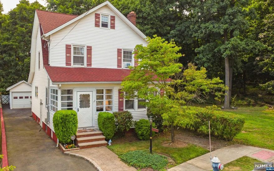 Welcome to the delightful enclosed porch. Inside, custom millwork & H/W flrs create an atmosphere of timeless charm. The L/R beckons w/abundant natural light streaming through windows that flank a cozy F/P, perfect for curling up w/a good book. Adjacent, a versatile den bathes in sunlight, ideal for a home office. Flowing seamlessly, the D/R sets the stage for memorable gatherings & culinary delights, conveniently connected to the eat-in kitchen w/pantry. Upstairs, 3 B/R's offer comfort & privacy, complemented by a full bath. The lower level expands the home's possibilities w/a vast space for family gatherings or recreation, complete w/bath-toilet, laundry & ample storage. Step outside to discover a well maintained backyard, featuring a spacious deck & garage access, ideal for outdoor entertaining. The driveway accommodates 4 cars. Perfectly situated, enjoy the convenience of nearby dining, shopping & the historic Thomas Edison laboratory, all within excellent walkability.