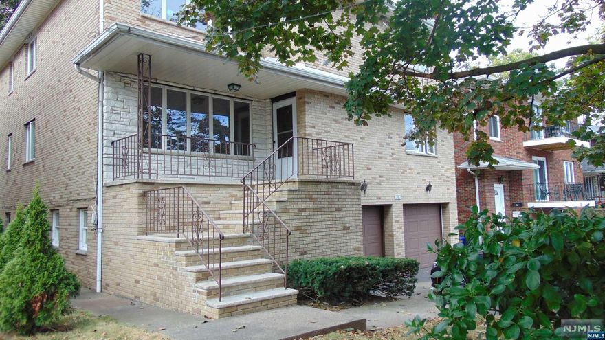 OPPURTUNITY KNOCKS! GREAT INVESTMENT PROPERTY. CENTRALLY LOCATED IN FORT LEE.ALL BRICK 2 FAMILY, TOP/BOTTOM WITH 3 BEDROOMS ,2 FULL BATHS ON EACH FLOOR.SPACIOUS.BRIGHT,WELL MAINTAINED. WOOD FLOORS THROUGHOUT.2 CAR GARAGE. SEPERATE WASHERS DRYERS IN BASEMENT.EASY COMMUTE TO NYC AND ALL MAJOR HIGHWAYS.WALK TO SCHOOL #3,SHOPPING ETC.