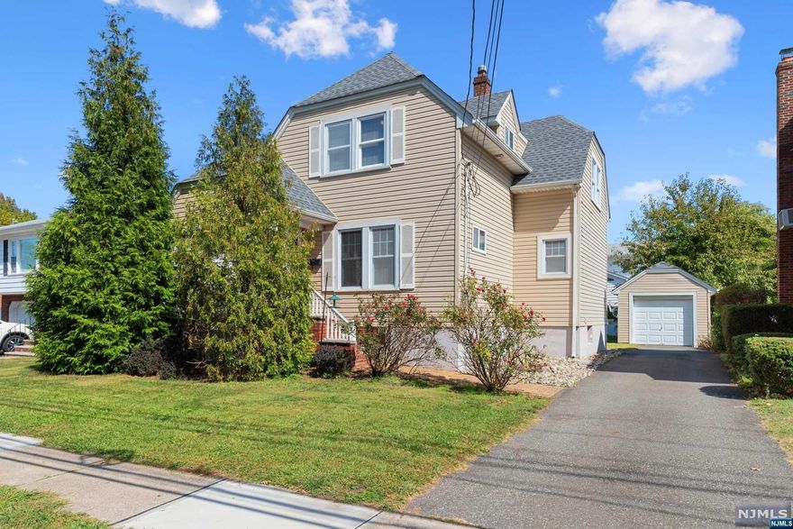 This Colonial style home offers a blend of classic charm and modern convenience. With 3 beds, 1.5 baths, and tall ceilings, it provides ample space for comfortable living. The kitchen is a standout feature, boasting updates including stainless steel appliances & elegant granite countertops. Oversized windows provide a ton of natural light. Throughout the home, hardwood floors exude warmth & character, while central air ensures year-round comfort. Outside, the front porch invites relaxation, while the spacious backyard is perfect for gatherings & activities. With a long driveway leading to a detached garage, parking is convenient. Recent upgrades include a new roof, A/C condenser unit, hot water heater & refrigerator. Newly installed French drains & sump pumps provide peace of mind as a preventative. Conveniently situated near major highways such as Rts. 17, 46, 80, & Garden State Pkwy. Minutes from Saddle River County Park & a wide variety of shops on Market St!