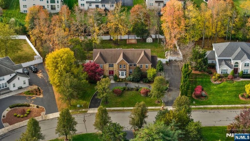Welcome to 3 Gramercy Road an impressive 5-bedroom, 5.5-bath Colonial offering scale, comfort, and thoughtful design throughout. A welcoming two-story foyer sets the tone, opening into a bright layout anchored by a family room with soaring ceilings and a gas fireplace that enhances the home's warmth and character. The main level includes a formal dining room, an eat-in kitchen with stainless-steel appliances, and plentiful cabinet space ideal for both daily living and hosting. Each bedroom is generously sized, with the primary suite featuring a well-appointed walk-in closet and a spacious ensuite bath. The finished basement adds even more livable space, complete with a bar area, additional lounge zones, and a dedicated laundry space, offering flexibility for recreation, fitness, or creative use. Outdoors, the property transforms into a private backyard oasis, featuring a serene setting ideal for relaxation, outdoor dining, or gatherings. A 3-car garage plus an expansive driveway provide ample parking and everyday convenience. Situated in Monmouth Junction, this home offers strong connectivity to major routes including Route 1, Route 27, Route 130, and the NJ Turnpike, along with nearby transit options that allow for efficient commuting throughout Central Jersey and into New York City. Proximity to local shopping, dining, and community amenities adds to the convenience of this well-positioned residence.