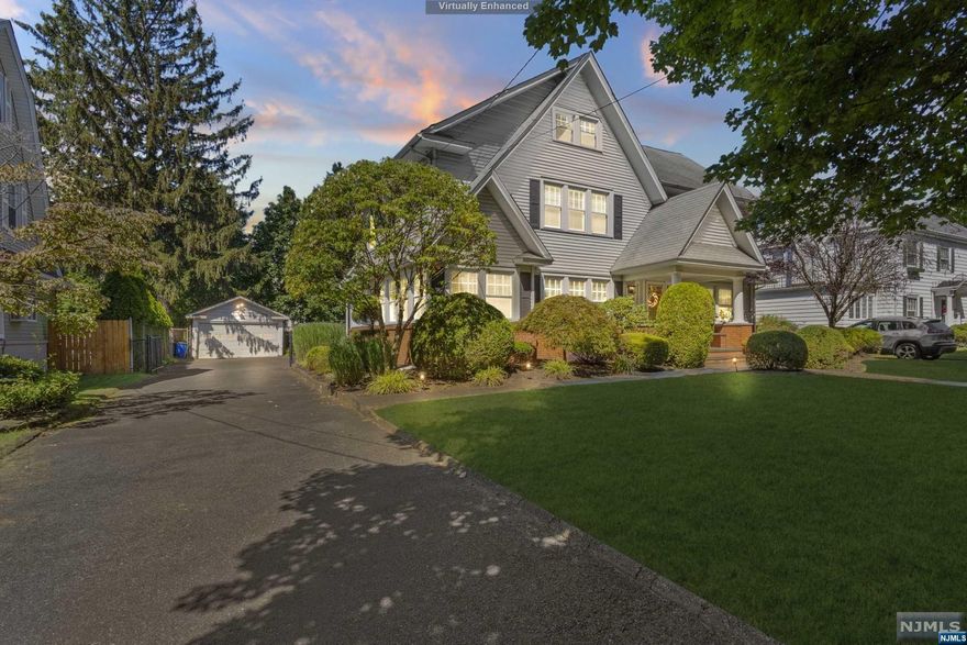 Welcome to this stunning Center Hall Colonial, a truly magnificent home seamlessly blending timeless charm w/ modern comforts. The entrance hall sets the tone, captivating you w/its allure. The front-to-back living room features a fireplace, recessed lighting, & French doors leading to a convenient office or playroom. Hosting elegant gatherings is effortless in the formal dining rm, while the modern eat-in kitchen boasts stainless steel appliances & a powder rm. The 2nd floor offers a primary bedroom w/ an ensuite bathroom, plus 3 generously sized bedrooms with ample closet space & full hall bthrm. A walk-up partially finished attic adds versatility. The Spacious lower level offers ample storage, a laundry area, and potential for a playroom or workspace. Outside, a flat play yard beckons for outdoor enjoyment. This home includes a full house water filtration system, water softener, and is conveniently located near NYC transportation. Don't miss the opportunity to make it your own.