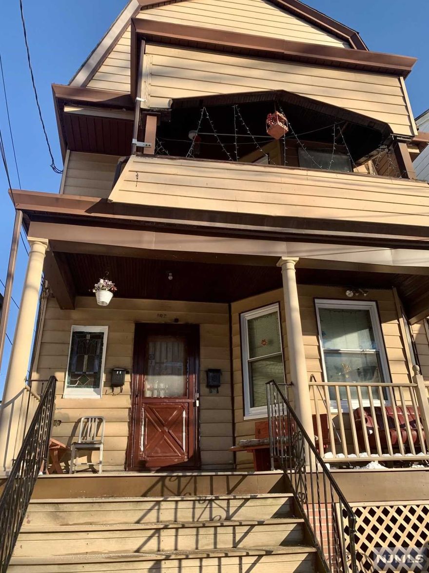 Two family with 6 bedrooms/3 bathrooms. 1st floor unit is 2 bedrooms/1 bath. 2nd unit is 4 bedrooms/2 baths with 2 bedrooom/1 bath on the second floor and 2 bedrooms/1 bath on the third flood with separate entry. Basement is unfinished. Detached garage in the back and driveway that fits 1 car. Property will be delivered vacant. SOLD-AS-IS.