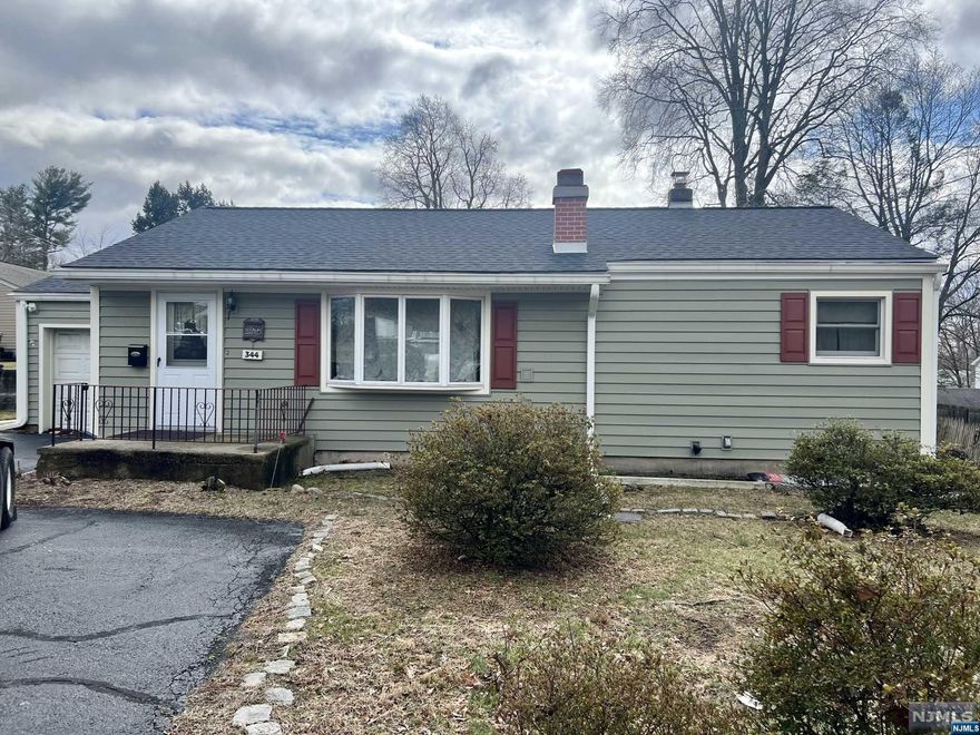 Here's your opportunity to purchase in Paramus! 3 bedroom, 2 bath ranch waiting for your personal touches, renovation or rebuild. 74 x 150 (approx) lot size. Hardwood floors where-in, large living room w/fireplace, large kitchen with door to patio & yard. 1 car attached garage with entrance to house. Full finished basement with 2 finished rooms, laundry/utility room & storage room. Newer gas hot air furnace & hot water heater. 100 amp electric panel, central air and low Paramus taxes. Perfect home for Investor, builder or ambitious buyer! To be sold as-is. Schedule your appointment today!