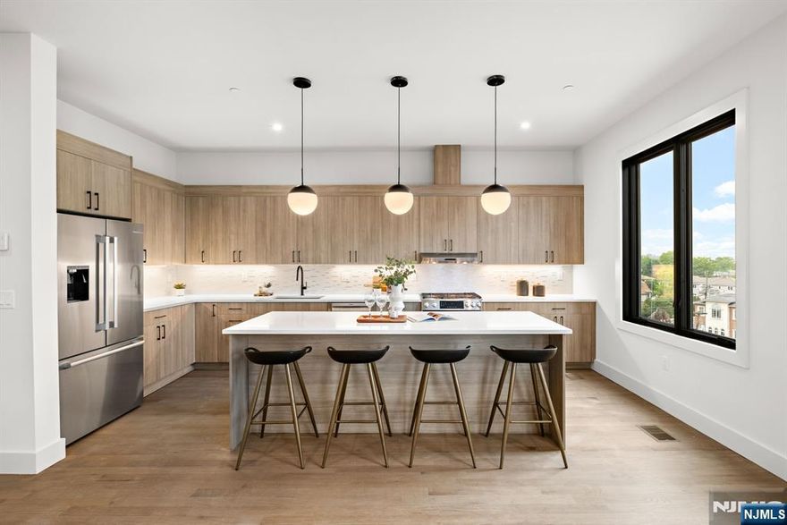 1 MONTH FREE WITH 14-MONTH LEASE - Be the first to live in this stunning brand-new construction the Luxury Loft residences in the heart of Fort Lee. This spacious unit spans approximately 2,500 sq. ft. across two levels and features 3 bedrooms, 3 full bathrooms, and a private balcony. Meticulously designed for modern living, the home boasts high ceilings, open-concept living and dining areas, and premium finishes throughout. The gourmet kitchen is equipped with top-tier appliances and sleek cabinetry, while each bathroom is thoughtfully styled with designer touches. Residents enjoy convenient access to one assigned parking space, plus the unbeatable locationâ€”just minutes from NYC, major highways, shopping, and dining. A rare opportunity to experience sophisticated suburban living with city convenience. Schedule your private tour today!