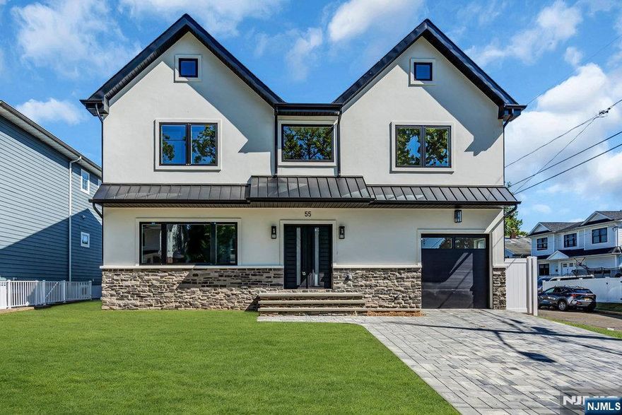 Welcome to this exquisite newly constructed home set on a desirable street, just a short walk to places of worship and convenient transportation. Hard coat stucco insures a maintenance free exterior. Thoughtfully designed with comfort and functionality in mind, this home offers 5 spacious bedrooms and 4.5 beautifully appointed bathrooms, including a luxurious primary suite retreat with walk-in closets and a spa-like bath. At the heart of the home is a chef-inspired kitchen featuring an oversized island, dual sinks, double ovens, two dishwashers, warming drawer, and expansive quartz counters designed for effortless meal preparation. A walk-in pantry and abundant cabinetry provide exceptional storage, while the kitchen flows seamlessly into family room and a massive dining and living areaâ€”perfect for hosting large gatherings, holiday celebrations, and everyday entertaining. The bright and open layout continues upstairs with expansive bedrooms featuring fitted closets. The finished lower level offers versatile space, ideal for a playroom, home office, or guest accommodations complete with a full bath. Outside, the fenced backyard with a sprinkler system, provides privacy and ease of maintenance. Foundation interior and exterior drains. Combining modern finishes, generous living space, and a prime location, this home is truly designed for todayâ€™s lifestyle. Too many features to listâ€”come see for yourself!