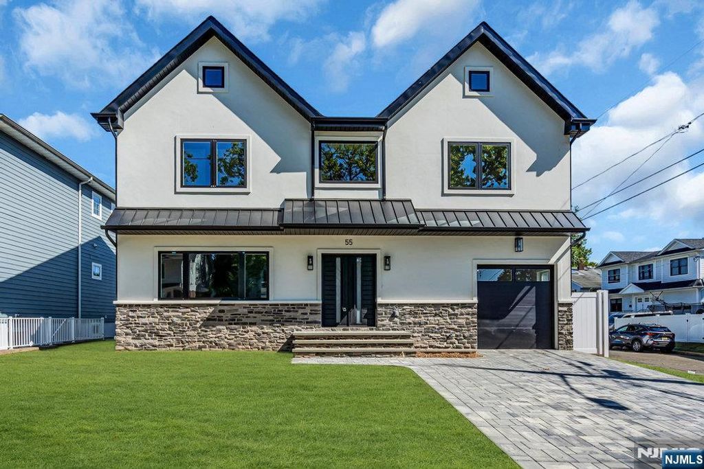 Photo of 55 Maiden Lane, Bergenfield, NJ 07621 (MLS # 25031650)
