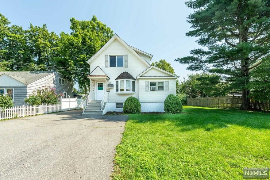 This quaint Cape Cod is tucked away on a quiet street. Hardwood and laminate floors throughout the First and second floors. Kitchen has entrance to the basement. Formal Dining Rm with slider to a large deck overlooking the flat and partially fenced in back yard. Spacious Living Rm with Bay window. Two large Bedrooms on the second floor. Lower level features partially finished basement with laundry, full bath & storage. Perfect opportunity to own in desirable Pequannock!!!