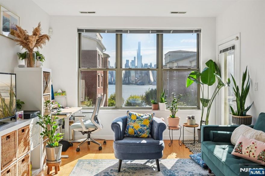 Direct NYC and Hudson River views from every room. Team Braconi presents this sun-filled 1BR/1BA, 767 sq ft home at Hudson Club features an open living/dining area with picturesque windows, a private balcony, and a modern kitchen with granite counters, breakfast bar, and stainless appliances, The bedroom also offers a true walk-in closet. In-unit washer/dryer, hardwood floors, central heat/AC, and ample storage. Hudson Club delivers resort amenities: riverfront outdoor pool with skyline panorama, 1/2-court basketball, social room, co-working area, movie theater, business conference room, party room, and 24-hour concierge. Prime Port Imperial location places you moments to the ferry, Light Rail, and Waterfront Walkway, plus shops and dining. Live the Gold Coast lifestyle with iconic views and a seamless Manhattan commute in a well-managed building known for its amenities and convenience.