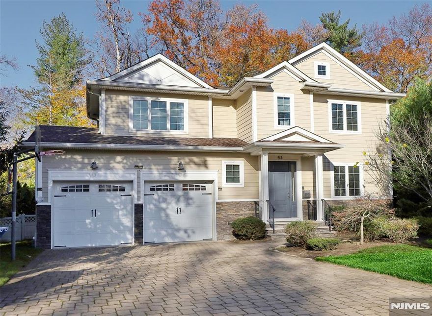 Welcome home! Just 13 years young and beautifully drafted with exceptional design details throughout, enjoy elegant touches including extensive moldings, coffered ceilings, and thoughtfully designed bathrooms. The oversized kitchen features Caesarstone countertops, high-end Thermador appliances, and opens to a breakfast area and family room; both with access to a large deck and fenced yard. The primary suite offers vaulted ceilings with cove lighting, dual walk-in closets, and a luxurious bath with oversized shower, corner Jacuzzi, and double vanities. All bedrooms are generously sized. The finished basement includes windows, a bright recreation room, and a legal bedroom. Additional highlights include equipped for EV charging, first-floor laundry off the spacious mudroom and generator readiness. Fabulous location; close to top-tier Tenafly schools, downtown, NYC trans, and more; donâ€™t miss out!