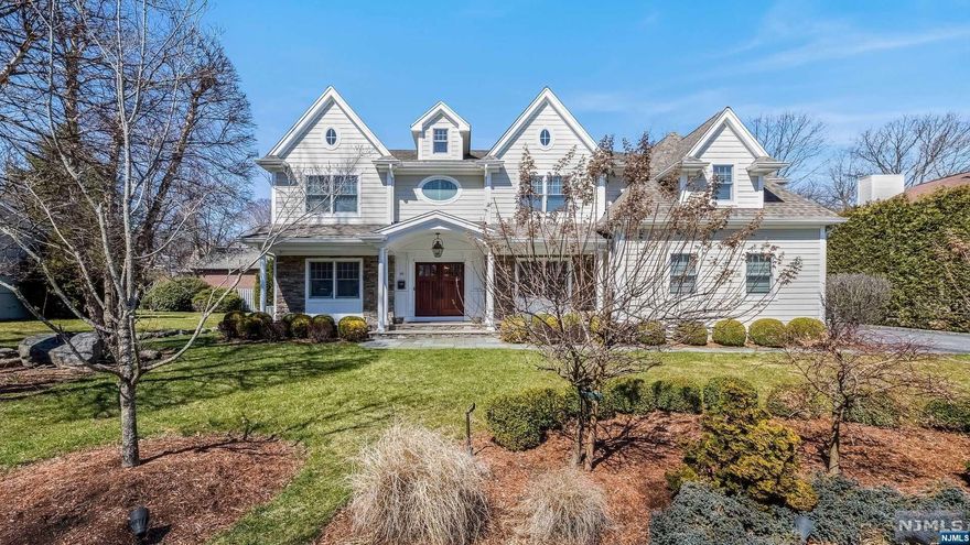 SPECTACULAR 6 BEDROOM, 5 1/2 BATH SPACIOUS COLONIAL.14 YEAR HOME LOOKS BRAND NEW.CUSTOM DETAILS EVERYWHERE.7000 SQ FT OF LIVING SPACE.1ST FLOOR FEATURES: LARGE ENTRY WITH RALPH LAUREN WALLPAPER.LR/MUSIC ROOM, FORMAL DININGROOM WITH COVE LIGHTING.POWDER ROOM, VAULTED GREAT ROOM WITH COFFERED CEILING AND MICHAELANGELO MARBLE FACED FIREPLACE. CUSTOM EAT IN KITCHEN WITH DINETTE AND RADIANT FLOORS, BUTLERS PANTRY WITH SUB ZERO WINE FRIDGE.BEDROOM, BATH, LAUNDRY, MUDROOM AND PANTRY.2ND FLOOR FEATURES: HALL WITH SITTING AREA. MASTER BEDROOM WITH TRAY CEILING AND BUILT IN CLOSETS. MASTER BATH HAS HIS AND HER WASH AREAS, CATH CEILING OVER JACUZZI, STEAM SHOWER WITH BODY SPRAYS. 2 BEDROOMS WITH JACK AND JILL BATH. HUGE EN-SUITE WITH LIBRARY LADDER TO SKYLIT CARPETED LOFT AND FULL BATH. LOWER-LEVEL FEATURES: NEWER BAR AND 1200 BOTTLE WINE CELLAR, 120' MOVIE SCREEN WITH PROJECTOR, PLAY AREA, BATH, BEDROOM. ALL BATHS HAVE RADIANT FLOORS. FENCED IN PRIVATE YARD AND PATIO. CLOSE TO ALL SCHOOLS.