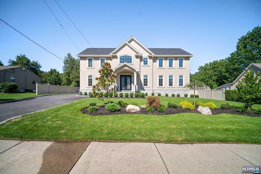 Discover the ultimate elegance, bright and inviting 4 bedroom / 4 full and 2 half bath residence. Home features two story foyer, living room , eat in kitchen, family room with gas fireplace, dining room, spacious bedrooms with beautiful bathrooms, steam room, wood floors, 3 zone central air, two car heated garage, full finished basement, water softener, sprinkler system with its own water meter, security system all around the house, Above ground pool, patio, the list can go on and on. This is a beautiful brand new full of character home you don't want to miss it.