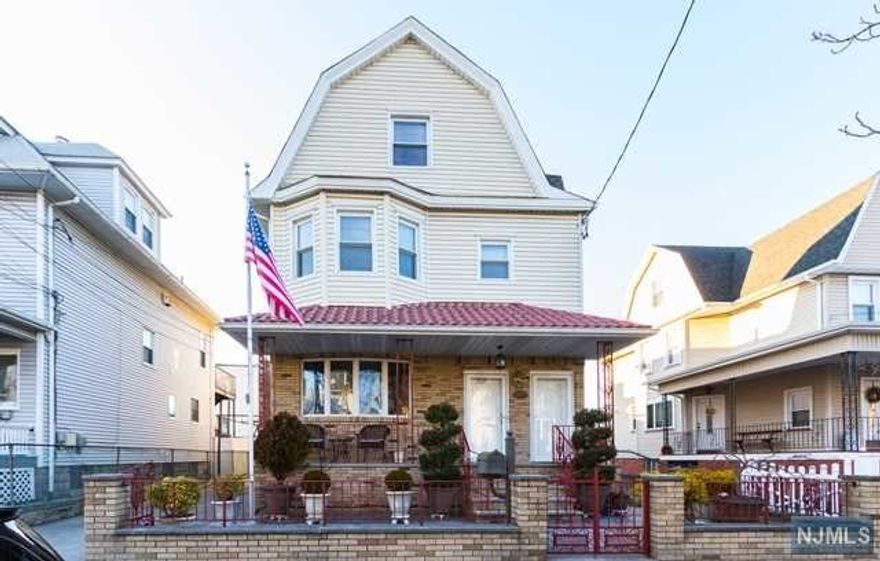 2 family with open front porch, large driveway -Center of Town location! 1st floor unit is modern and with Living room-Dining room combo, modern kitchen with granite countertops , 2 bedrooms and tile bath. 1st floor has mini split air conditioning system. 2nd & 3rd floor are used together consist of Living room-Dining room combo, kitchen, family room, 2 full baths and 3 bedrooms. Finished basement with recreation room, full bath, summer kitchen & laundry room. 2 separate gas hot water baseboard heating systems, 2 hot water boiler, 2 electric and gas meters. Tiled kitchens & baths, hardwood floors on 1st & 2nd floor. Replacement windows, roof is approx. 6 years old. Lovely rear yard with grape vine trellis and patio. 1 Block to Kearny Ave shops and buses!