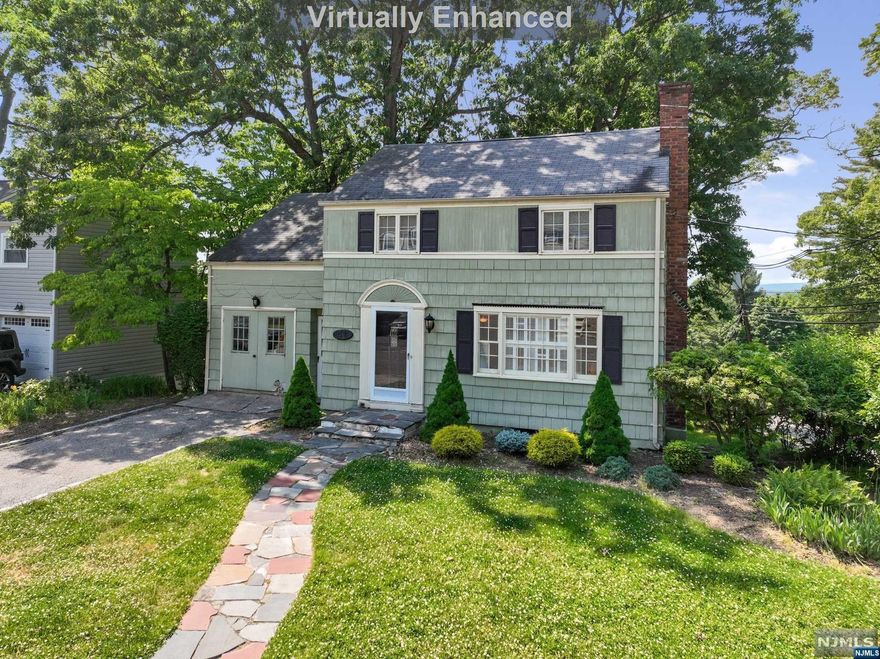 Welcome to this classic colonial home located in the desirable Presidential Section of West Caldwell. This charming residence offers a very comfortable layout with 3 spacious bedrooms including a large primary and 1.5 baths. This property is perfect for those seeking a traditional yet cozy living space. Upon entering, you will be greeted by the warmth of the hardwood floors that flow throughout the formal living and dining rooms. Off the dining area is an additional living room with an inviting atmosphere and overflow of natural sunlight. The eat-in kitchen is complete with stainless steel appliances, abundant cabinetry and walkout slider doors to the deck. The backyard and deck provide an ideal setting for outdoor gatherings and entertaining guests. Whether it's hosting a barbecue or simply enjoying a peaceful evening, this home offers the perfect backdrop.