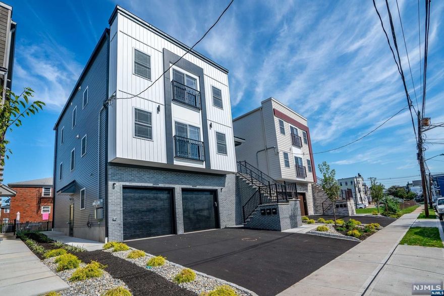 Stunning BRAND NEW Two-family home at Peterstown section of Elizabeth! Move in or rent out worry-free with a 10-Year Home Warranty and save big with a 5-year tax abatement! Unit 1 features 3 bedrooms, 2 full baths and is connected to the ground level offering an additional bath, recreational space to be used to your liking and walk-out access to a private backyard! Unit 2 is comprised of 3 bedrooms and 2 full baths. Both units offer a modern, stylish, and open concept layout, spacious kitchens, SS appliances, in-unit washer/dryer hookups, central AC/forced hot air, hardwood flooring, separate utilities, closet space, and more! Conveniently located, just a 34-minute train ride to NY Penn Station. SPECIAL FINANCING FOR QUALIFIED BORROWERS AVAILABLE AT DISCOUNTED INTEREST RATES, NO MI, CLOSING COST ASSISTANCE.