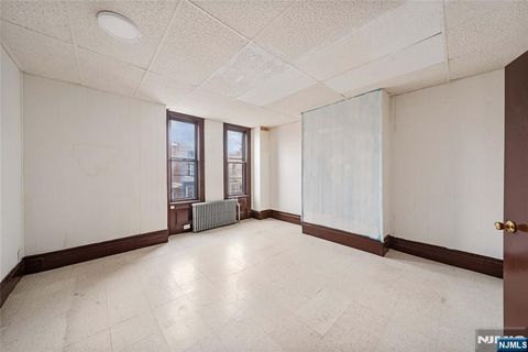 Photo of 73 Virginia Ave, Jersey City, NJ 07305 (MLS # 25038846)