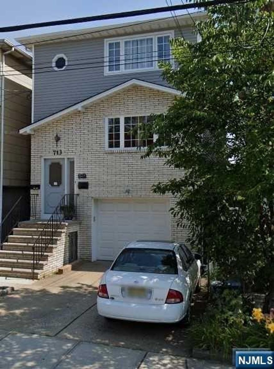 Spacious first-floor apartment featuring three bedrooms, an eat-in kitchen, a combined living and dining area, and a full bathroom. The unit offers central air conditioning and one designated parking space. Conveniently located within short distance of the PATH Train Station, as well as close to public transportation, major highways, restaurants and shopping centers. No pets allowed.