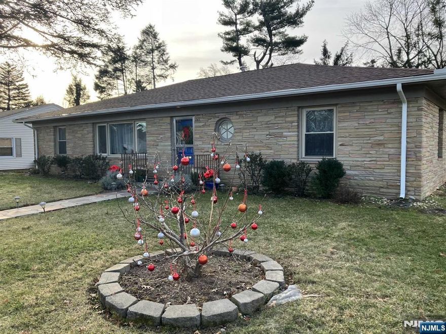 Nestled in the heart of the Seven Oaks Section of Orange is 262 Roberts Rd, a no-step ranch that exudes elegance. At over 2000 sq ft, this well cared for house has a welcoming living room and a generously sized dining room. The house has a sun-lit den with stone detailed wall & floor to ceiling windows that look onto a serene backyard. The eat-in kitchen is bright and has granite countertops, stainless steel appliances & white cabinetry with self-closing drawers. The primary bedroom is quite large with an ensuite bathroom and 2 closets. The second bedroom is well-sized, located next the 2nd full bath. This house has plenty of storage, central air, a laundry area/mudroom, a 2 car garage and a long driveway.The roof was replaced in 2018, a new garage door was put in in 2019, and a new boiler was installed in 2022. Weatherization occured along with additional insulation in attic in 2022. Don't miss this opportunity to own a special house in a tranquil neighborhood.