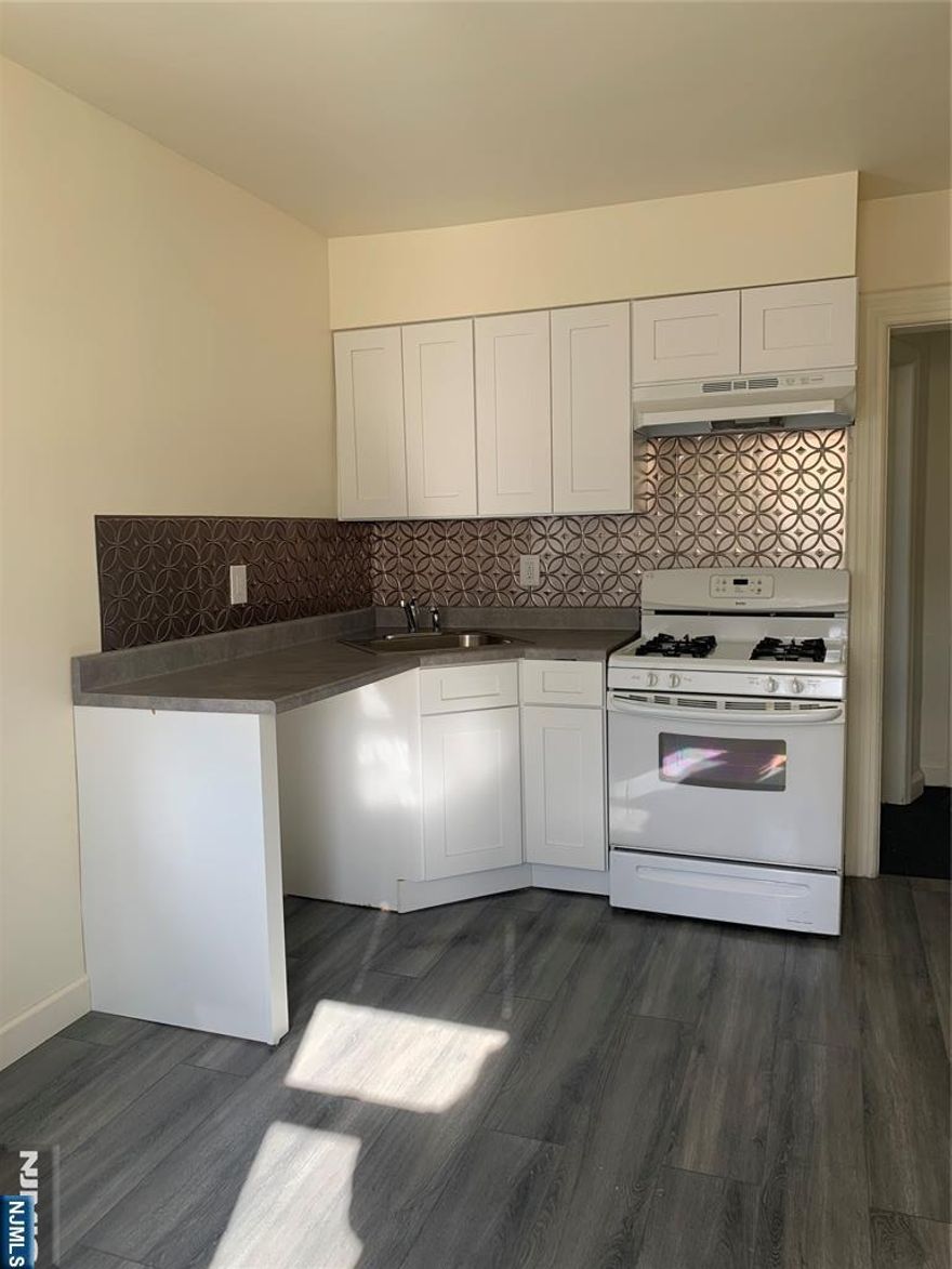 Welcome to this updated 2 bedroom apartment in North Arlington. New kitchen & Bathroom. New rugs & flooring throughout main living space. Tenants pays electric, use of yard is permitted. Owner pays heat & hot water. Office space in unit. Pets conditional. Some storage in basement. Laundry in basement. Close to shopping, bus & more. Credit report / income verification / pay stubs required.