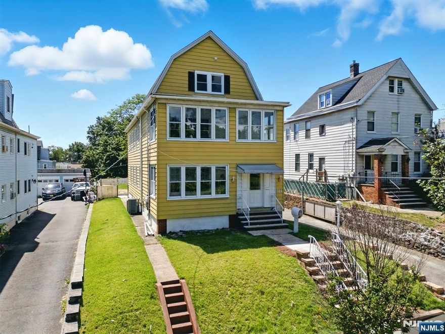 Welcome to this beautifully renovated two-family home in the heart of West Orange! This property offers a perfect blend of modern finishes and comfortable living, ideal for both homeowners and investors. Unit 1 features 3 bedrooms and 1 full bath, while Unit 2 expands across two levels with 4 bedrooms and 2 full baths. Both units have been tastefully updated with brand new kitchens featuring quartz countertops, stainless steel appliances, and gorgeous cabinetry, perfect for everyday cooking and entertaining. The brand new contemporary bathrooms are elegant with modern fixtures and sleek finishes. This home offers freshly painted interiors, new flooring, and abundant natural light, creating a warm, move-in-ready atmosphere. Outside, enjoy a long driveway leading to a detached garage, providing ample parking and storage space. A private backyard creates the perfect space for outdoor gatherings, gardening, or relaxing afternoons. Conveniently located near parks, schools, shopping, and transportation, this home combines style, space, and versatility. Move-in ready and fully updated, don't miss your chance to own this stunning two-family home in West Orange!