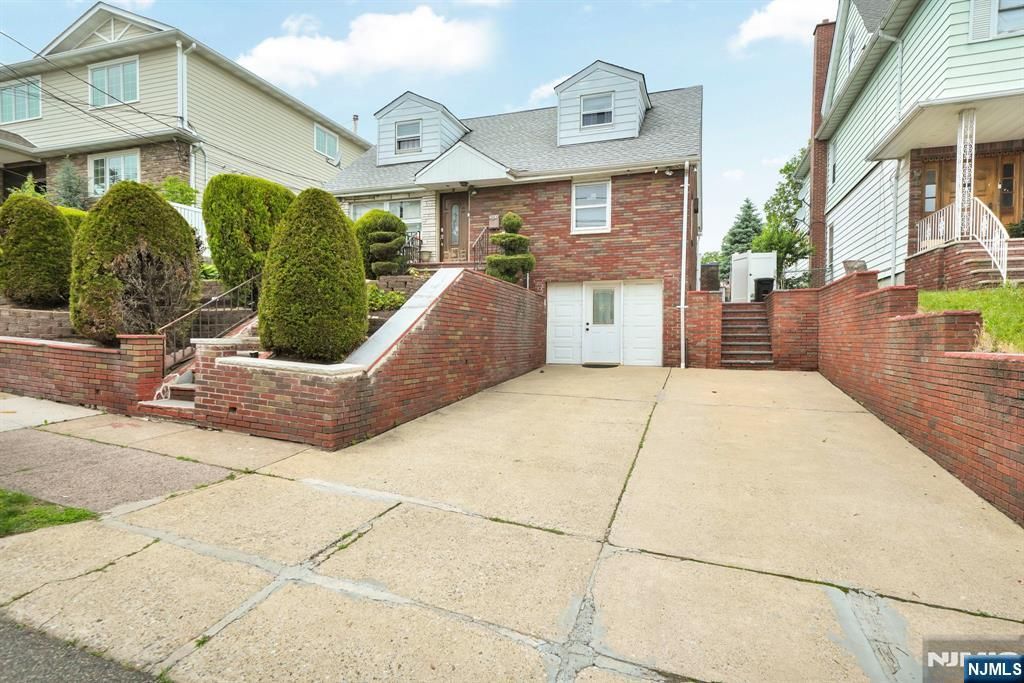 Photo of 161 Plauderville Avenue, Garfield, NJ 07026 (MLS # 26020151)
