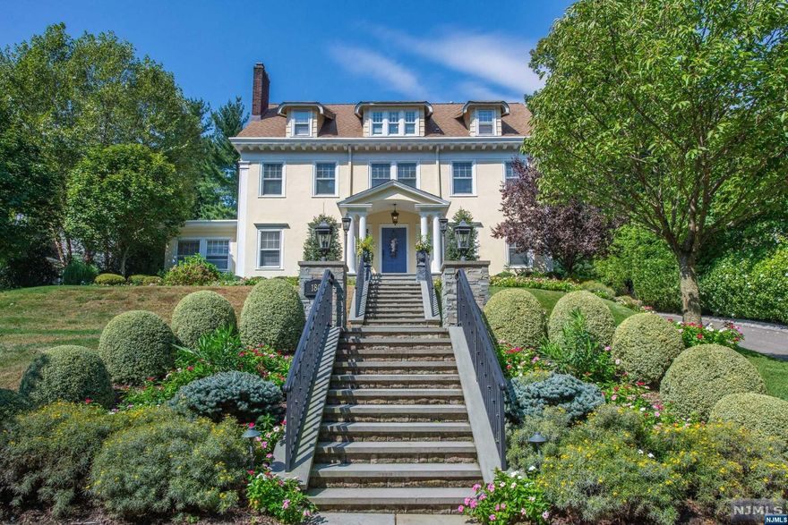 Totally renovated top to bottom in 2014, this stunning, move-in ready, 6 bed, 3.1 bath center hall colonial will take your breath away from the curb. Once inside, the stately foyer with grand staircase will welcome you home. First floor includes spacious kitchen running the depth of the house. Oversized island with caesarstone quartz counters, double La Cornue stove, convection oven, 2 sinks, 2 dishwashers, wine fridge and prep space galore. A very large in-kitchen dining space overlooks the front yard. Custom mudroom and butler's pantry off the kitchen provides extra storage. The formal living room with newly restored, converted gas fireplace opens onto the elegant dining room with curved ceiling and Farrow and Ball wallpaper. Perfect location, so close to Watchung Plaza, downtown, Edgemont and Anderson Parks, trains, buses and so much more.