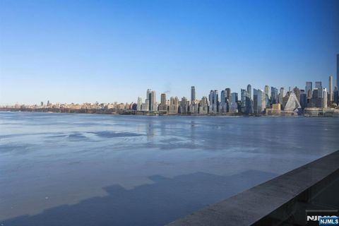 Photo of 1000 Avenue At Port Imperial #PH702, Weehawken, NJ 07086 (MLS # 26005086)