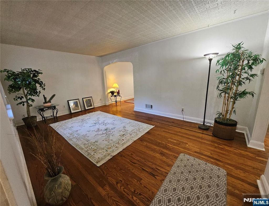 Photo of 55 Rutgers Place, River Edge, NJ 07661 (MLS # 25037772)
