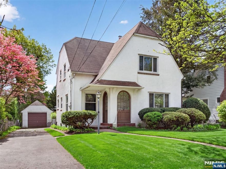 Opportunity awaits the visionary ready to write the next chapter of this storybook home. A classic 3 Bedroom, 1 Bath Tudor located in the sought-after Somerville school district, this home is nestled on a quiet tree-lined street, surrounded by homes of higher value, and walking distance to all that Ridgewood has to offer. Original millwork, wood floors, curved archways and a wood burning fireplace are just some of the features that keep the charm and character of the home. A large, level backyard with a gazebo round out this offering. Bring your imagination and contractor! Photos have been virtually enhanced and staged to assist with your vision. This home is being sold strictly AS IS.
