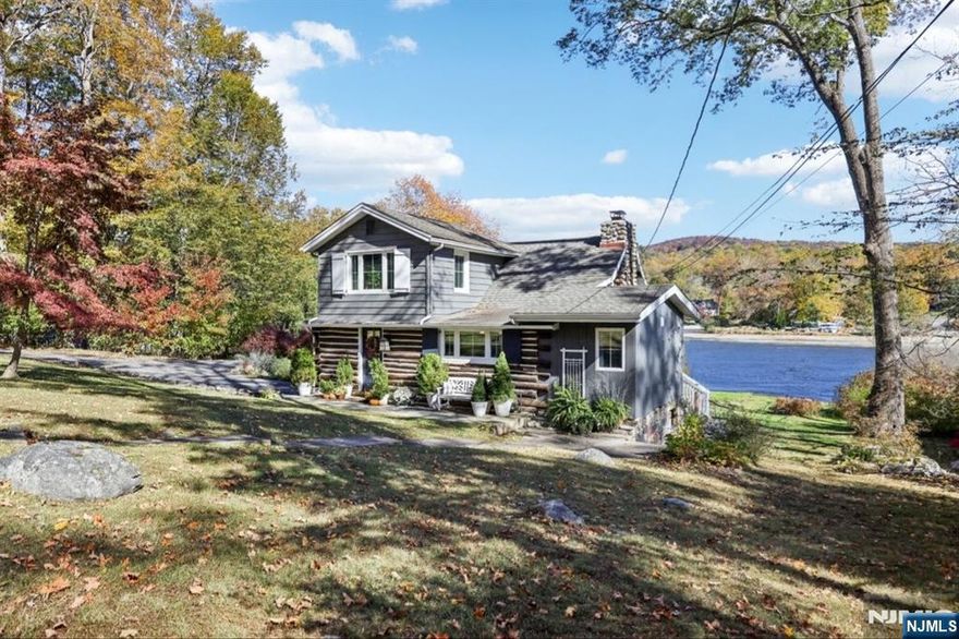 Quintessential Cupsaw Lakefront Cabin Welcome to the ultimate lakeside retreat. This charming Cupsaw Lakefront Cabin perfectly blends rustic character with modern comfort. Nestled on one of the most desirable pieces of property in the community, this beautifully updated home offers serene lake views and direct water access, creating an ideal retreat for every season. Step inside to find warm wood accents, a stunning fieldstone fireplace, and cozy living spaces that exude cabin charm. The renovated kitchen features picturesque views of the lake, making every meal feel like a getaway. The first-floor primary suite includes a new en suite bath, offering both convenience and privacy. Upgraded bathrooms, tasteful finishes, and thoughtful updates throughout provide a seamless blend of past and present. Outside, enjoy a sprawling yard, deck, patio, and a large private dock, perfect for entertaining, relaxing, or soaking in sun over Cupsaw Lake. Whether you're looking for a full-time residence or a weekend getaway, this property is a rare opportunity to own a slice of lakefront paradise in one of Ringwoodâ€™s most sought-after communities. Live lake life to the fullest at 257 Cupsaw Drive.