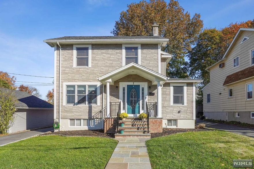 Welcome to this beautiful 4 bedroom colonial with modern updates and an open floor plan for easy entertaining and comfortable daily living. The sunny 1st fl features large inviting foyer; kit with SS appliances and separate dining area open to spacious fam room with stylish stone accent wall; formal dining rm; den perfect for home office or playroom; and updated powder rm. Head upstairs for the spacious primary bedrm with soaring ceiling and gorgeous Palladian window, large walk-in closet and updated full bath with soaking tub, separate shower and heated floors. 3 additional bedrms and a modern updated main bath complete the floor. Finished basement adds plenty of space w/ ample storage and room for recreation. Enjoy the deep backyard and patio for outdoor fun. Home features include smart technology to control lights, security and thermostat from your phone; newer AC units; painted in a neutral palette;closet organization systems; custom window treatments; underground sprinklers.