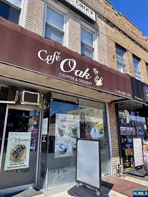 Photo of 329 Broad Avenue, Palisades Park, NJ 07650 (MLS # 25024928)