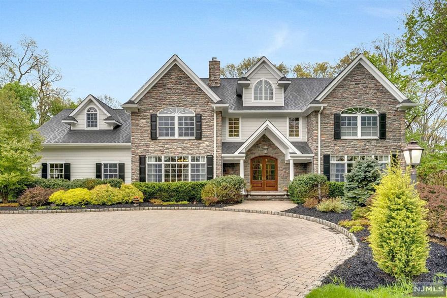 ** Team Braoni Christies Int Listing. Custom country manor situated on 1.75 acres in ideal location. This home is ideal for entertaining offering tremendous details, upgrades and space throughout. Entering the home you are greeted by the impressive two story entry foyer, designer kitchen with cherry cabinets, granite counter tops, sub-zero fridge, two miele dishwashers, wolf 6 burner range, double ovens warming drawer and more. Each room throughout the home is spacious and oversized including the 2 story great room with fireplace, banquet style dining room, butlers pantry and two first floor powder rooms. The second floor offers 4 additional bedrooms plus a master suite with sitting area. The basement is finished and has a den/office, rec room, fitness area, wine cellar, tool room, storage and easy access to the garage. The home also features 5 zone heat, 4 zone cool, 20kw generac, central vac, sonos, irrigation system, 300 amp electric, water filtration system and mo