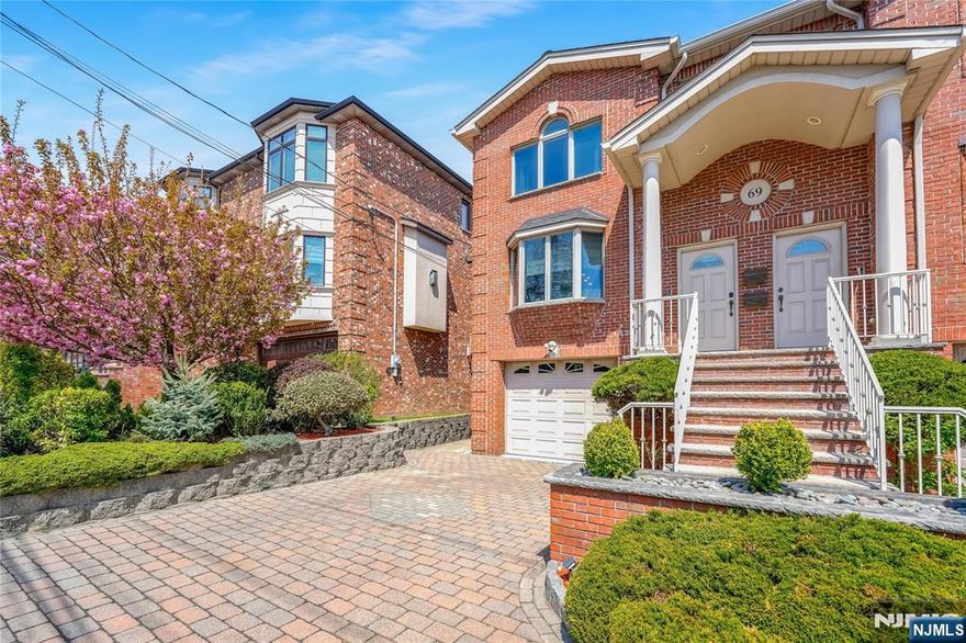 Discover this spacious and meticulously maintained townhouse in highly sought-after Cliffside Park. Built in 2003, this home offers the perfect blend of comfort, space, and convenienceâ€”ideal for multi-generational living and easy commuting. The bright, multi-level layout features 3 generously sized bedrooms and 3.5 baths, including a private primary suite with an ensuite bathroom and an oversized Jacuzzi tub. Hardwood floors run throughout most of the home, complemented by real marble and granite finishes in the kitchen, basement, and bathrooms. The main kitchen is equipped with stainless black steel appliances and granite countertops, perfect for everyday living and entertaining. The expansive ground level offers separate access, a full kitchen, and a full bathâ€”ideal for an extended family suite, recreation space, or private home office. Additional features include LED lighting, central vacuum, 3-zone baseboard heating, central AC, and a fully monitored alarm system with fire and carbon monoxide detection. Enjoy outdoor living in the private fenced-in backyard with deck accessâ€”perfect for relaxing or entertaining. This all-brick home also features a newer roof (2 years old) and includes two parking spaces, one heated and covered. Conveniently located near public transportation, top-rated schools, shops, and dining. Move-in ready and designed for modern living!