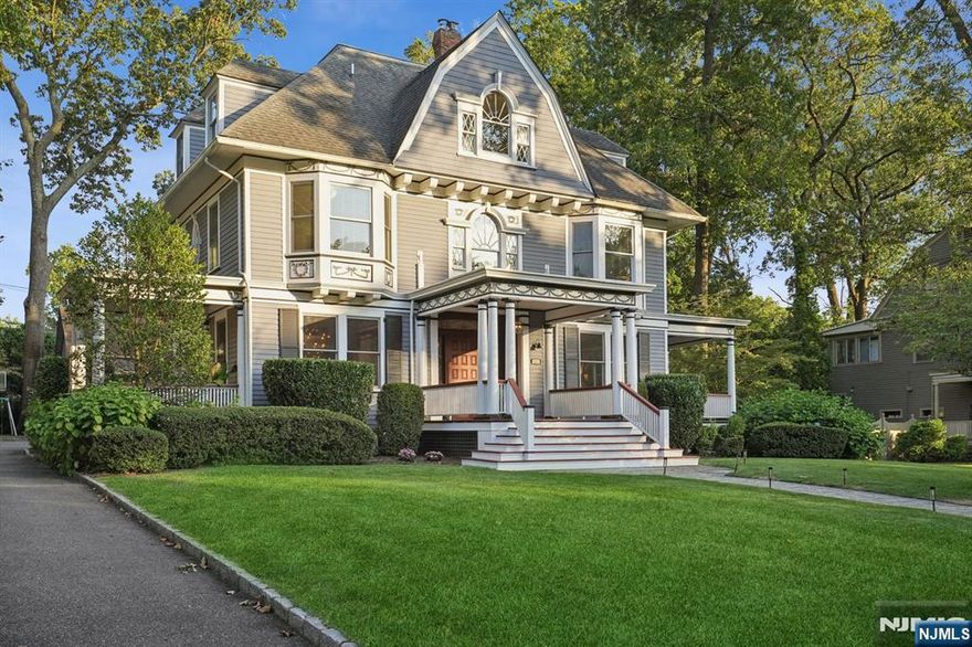 Welcome to one of Glen Ridge's most special homes. Gorgeously set on a premiere piece of property in the heart of town, this 6-bed, 3.5 bath 1895 Colonial is a grand masterpiece. Following a restoration in 2012, this home was honored with an Historic Preservation Award. The original details of the home - exquisite mahogany millwork, pocket doors, custom moldings and sky-high ceilings - were carefully combined with today's modern must haves: a cook's kitchen, elegant primary suite, expansive stone patio with an outdoor kitchen and fire pit. The first floor features a formal living room and dining room flanked by two side porches, the eat-in kitchen with stainless steel appliances, powder room, laundry room, mud area and a generous family room with custom cabinetry, all of which overlook the incredible backyard. Spacious primary suite with walk-in closet and luxurious bath plus 5 other bedrooms and 2 baths complete the interior. Central AC, built-in generator, whole house water filter, and irrigation system. Ample outdoor entertaining space on a large stone patio and flat yard. The one-of-a-kind barn brings rustic charm to this beloved property. Outfitted with full electric, the wide-open layout offers flexibility for whatever you may need - movie theatre, gym, or perhaps a game of ping pong! Located only a few blocks to schools and NYC direct train station. Simply outstanding in every way! Please see the attached list of inclusions.